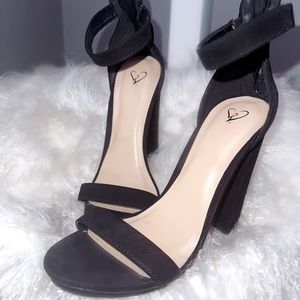 Black platform block heel. Lightly worn. Back zipper. comfortable. Suede heels.